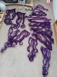 Purple Hair Covering 3/4 of my Guest Room Floor